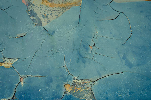 istock cracked and peeling paint on an old car 508611405