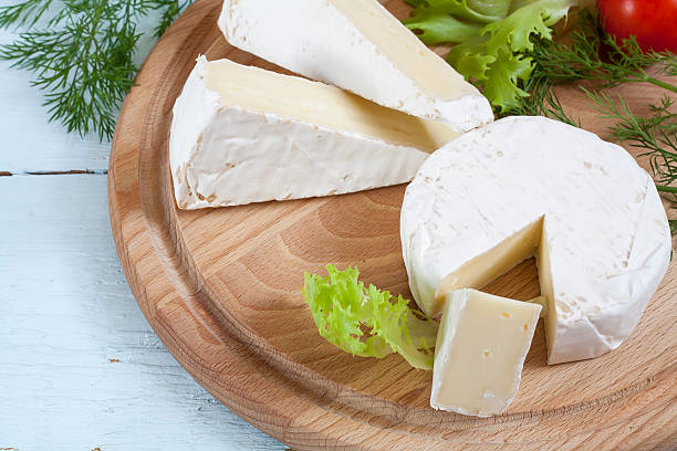 istock Dairy products. Camembert and brie cheese. 508618354
