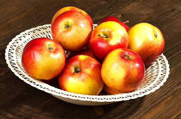 istock fresh apples on a wooden table in the background 508619560