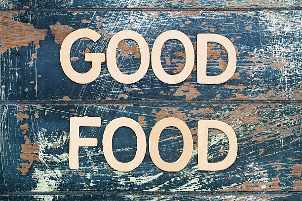 istock Good food written with wooden letters on rustic surface 508619728