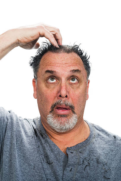 istock Middle aged white man checking his hair cut 508620730