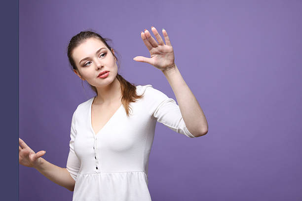 istock Young girl working with virtual screen 508621474
