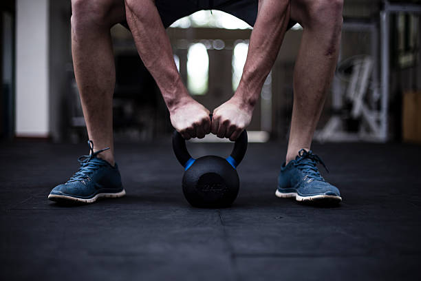 istock Kettle bell exercises at the gym 508623158