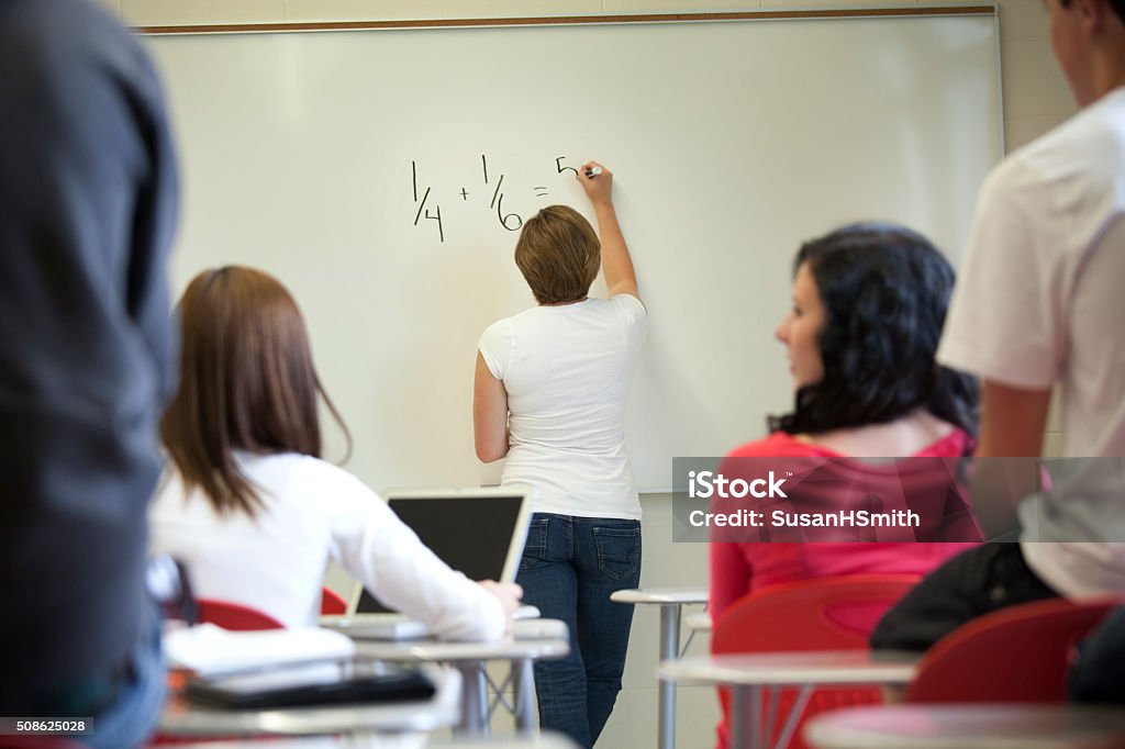 Some Doing Math Student Doing Math In Classroom Stock Photo - Download Image Now ...