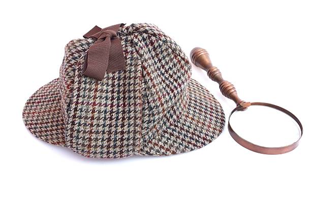 istock Deerstalker or Cap or Hat and vintage magnifying glass 508625445
