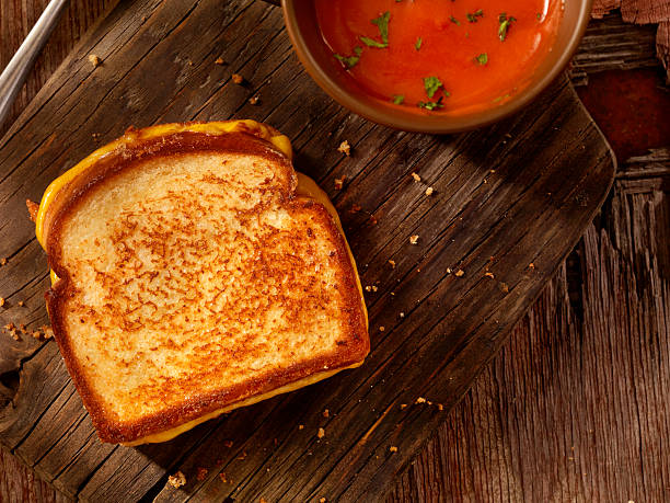 istock Grilled Cheddar Cheese Sandwich With Tomato Soup 508625836