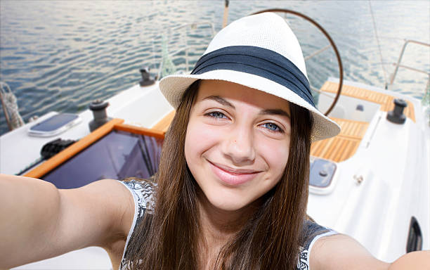 Self-portrait of a young beautiful woman Beautiful girl taken pictures of her self, instagram yacht selfie stock pictures, royalty-free photos & images
