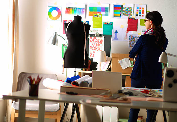 istock Beautiful fashion designer standing in studio 508626240