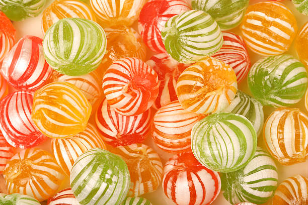 istock Colorful hard candies isolated on white background 508627790