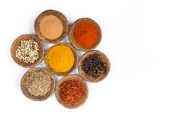 istock Bowls of fresh spices isolated on white 508627853