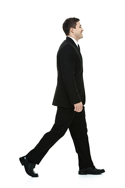 istock Smiling businessman walking 508629091