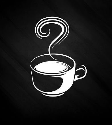 Picture a cup of coffee on a black background