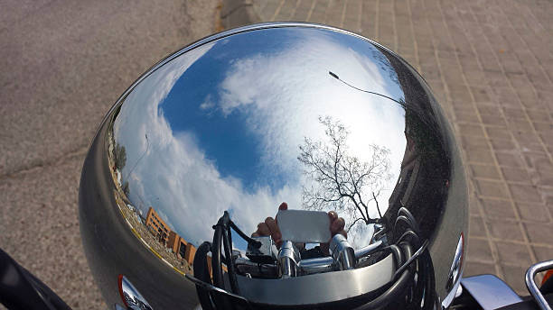 reflections in a custom motorcycle chrome-plated lighthouse