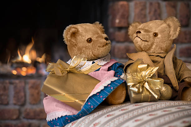 istock vintage teddy bears  in front of fireplace 508630983