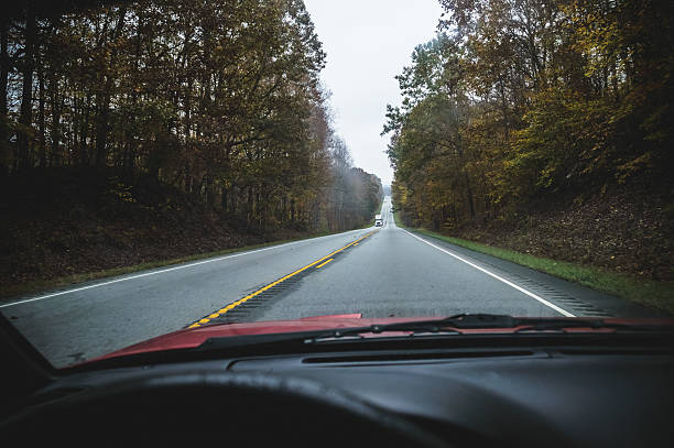 istock Travelling down a long foggy road 508631618