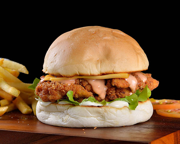 istock hamburger with chicken and cheese on a wooden 508632480