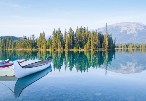 canoes on a beautiful mountain lake. Jasper, Alberta, Canada. Summer scenic.