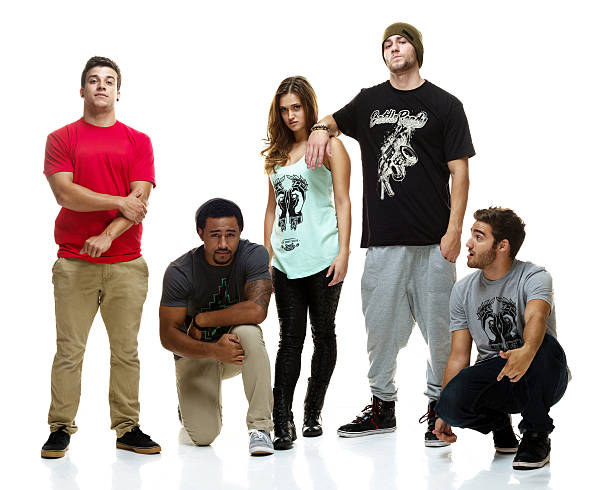 Skater chick with her boys behind her. 