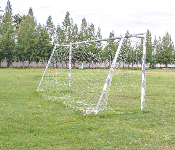 istock old soccer goal in field with white cloud 508648243