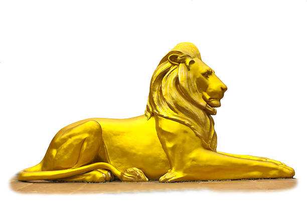Plaster sculpture of a lion in a picture frame.