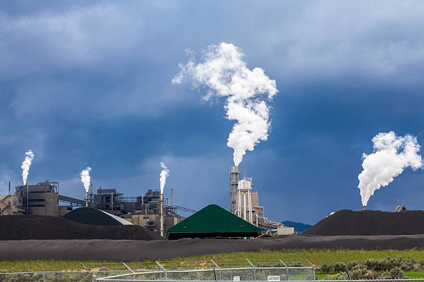 istock Fuming chimney of a factory 508649541