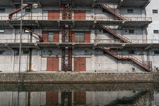 Namikura red brick warehouse by river after sunrise, Yanagawa, Fukuoka, Japan. Famous destination to cruising and sightseeing along river.