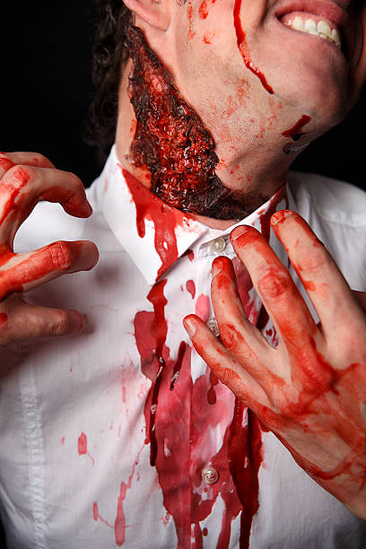 istock Psychopath with bloody fingers 508651441
