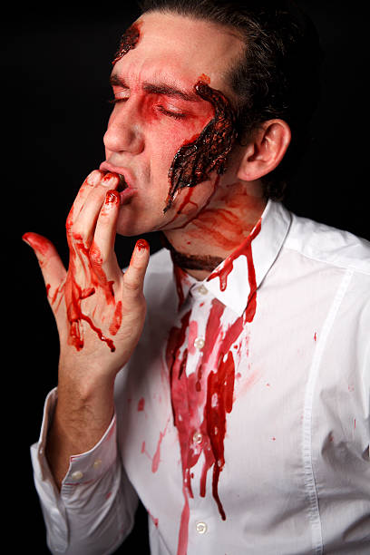 istock Psychopath with bloody fingers 508651447