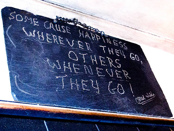 Oscar Wilde Quote Handwritten quote by Oscar Wilde in a pub in Co. Clare, Ireland oscar wilde stock pictures, royalty-free photos & images