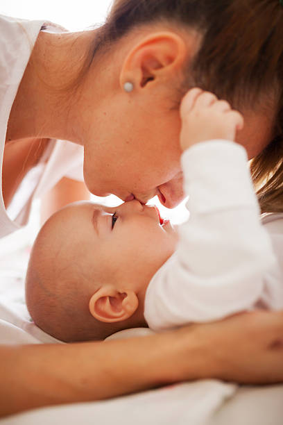 istock Mother kissing son's nose 508653145