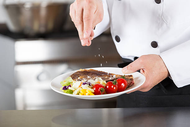 istock Chef finishing your plate 508657520