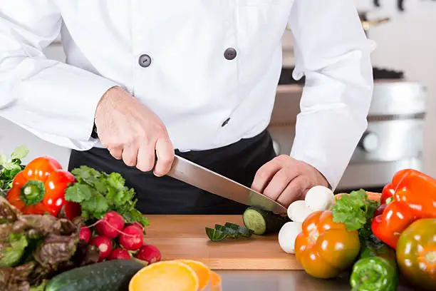 Photo of Chef chopping vegetables