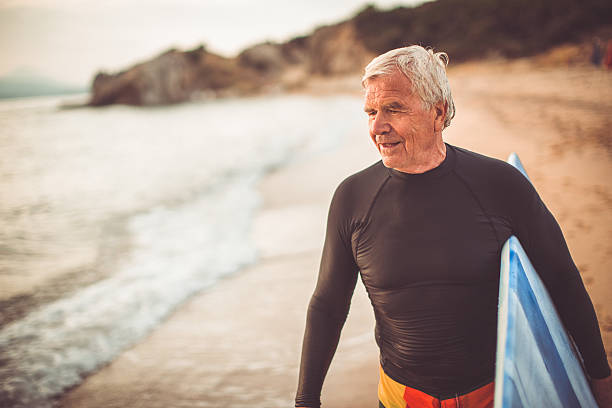 istock Portrait of a senior surfer 508659502