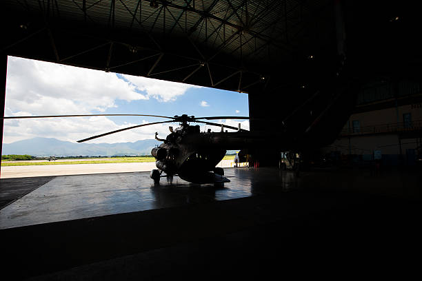 istock silhouette of a helicopter in the hangar 508660202