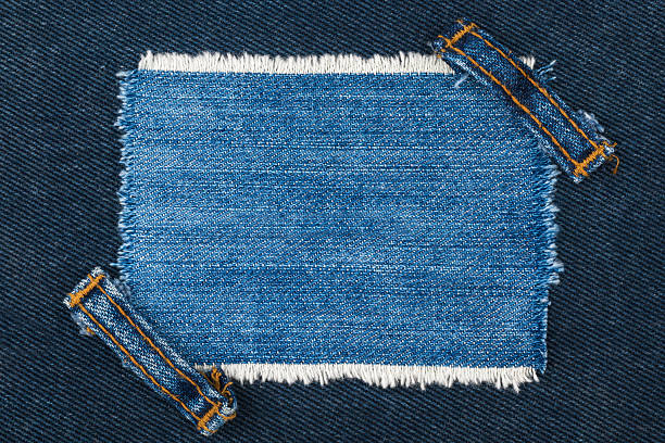 istock Frame with two straps jeans, lies on the dark denim 508660520