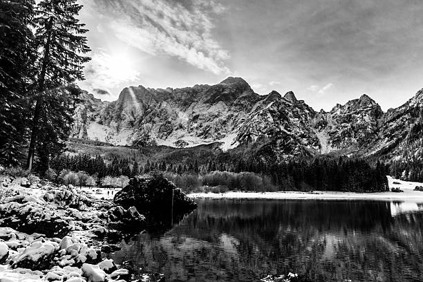 istock first snow at the mountain lake 508660682
