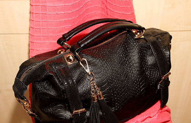 istock Women's handbag and scarf.. 508661662