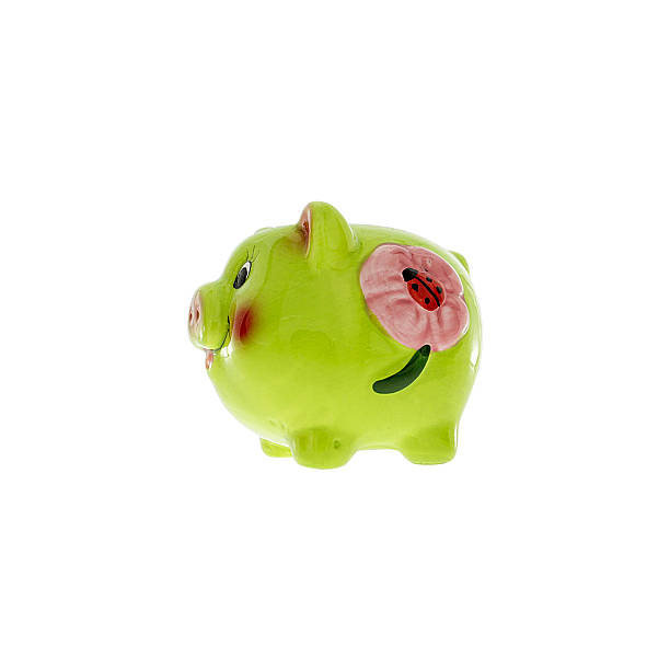 istock Green ceramic piggy bank isolated on white 508662572