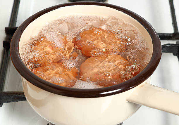 istock Boiling eggs in saucepan on gas stove 508662754