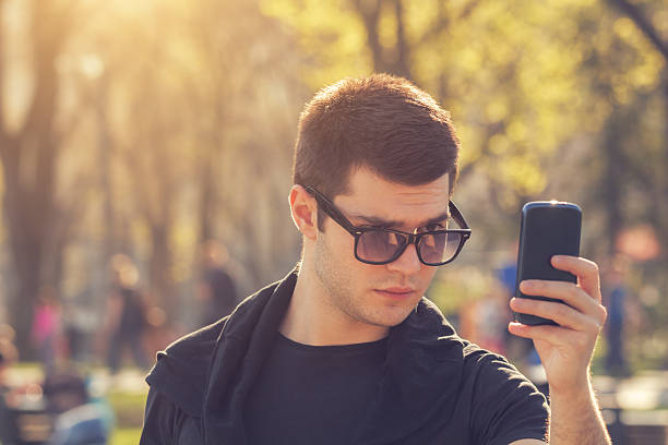 istock Urban guy with a cellphone outdoors. 508663298