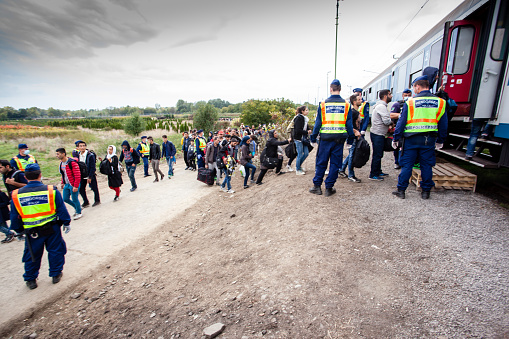 Zakany, Hungary - October 6, 2015: War refugees at Zakany Railway Station, Refugees are arriving constantly to Hungary on the way to Germany. 6 Octoberber 2015 in Zakany, Hungary.