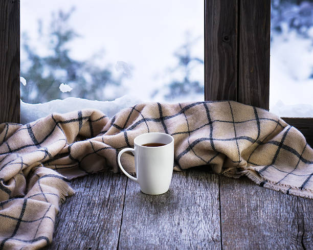 istock White cup of coffee on stylized wooden window sill. 508666276