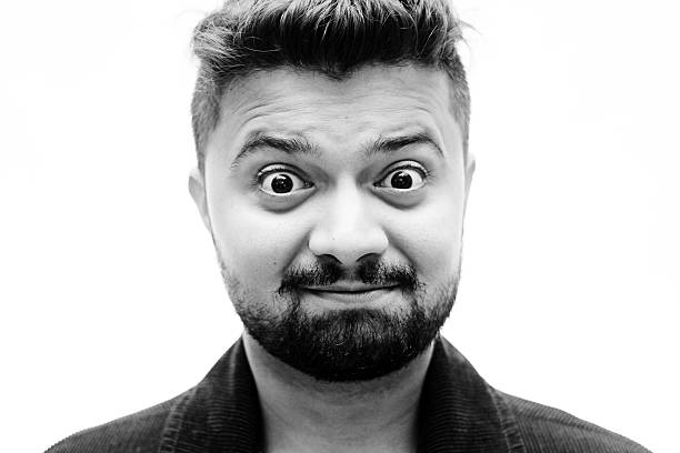 istock Close-Up Studio Portrait Man Happily Surprised Facial Expression on white 508667058
