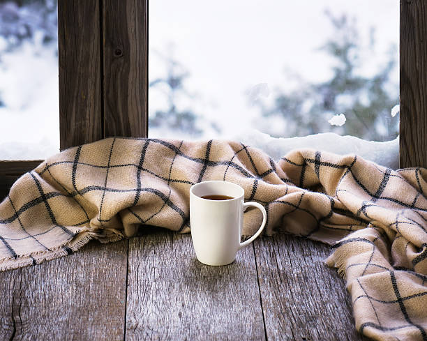 istock White cup of coffee on stylized wooden window sill. 508668538