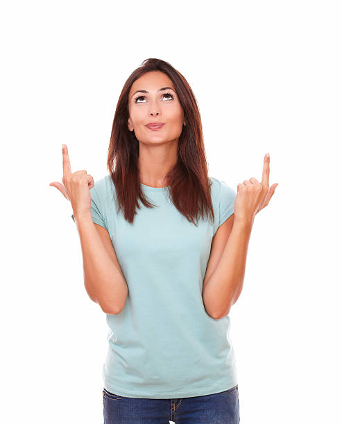 istock Pretty friendly woman pointing up her fingers 508668979