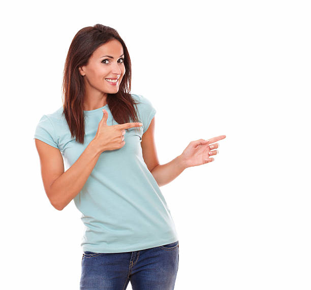 istock Fashionable latin lady pointing to her left 508669101