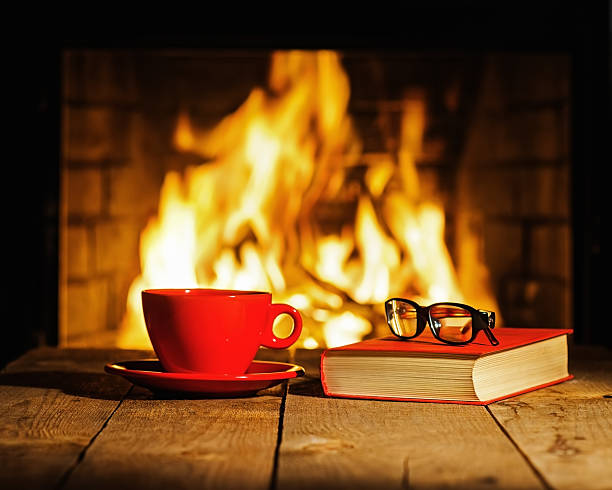 istock Red cup of coffee , glasses and old book 508669670