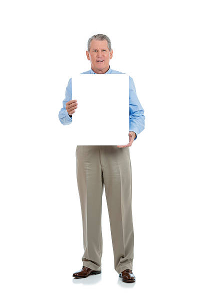 istock Senior man holding a sign 508670639