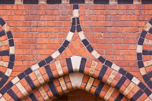 Elaborately patterned brickwork of a former granary built in the nineteenth century, UK
