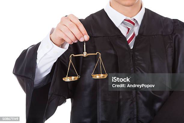 Judge With Scales And Book Stock Photo - Download Image Now - Weight Scale, Holding, Justice - Concept